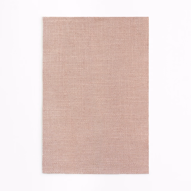 Dusty bois-de-rose pink fabric with a fine, even crosshatched weave
