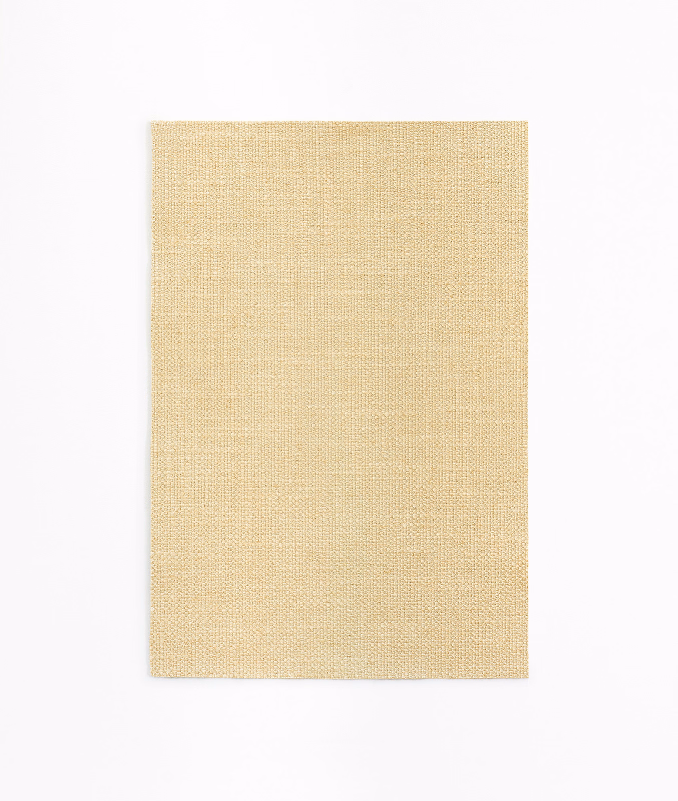 Pale burro beige fabric swatch with a fine, closely woven matte surface