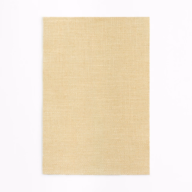 Pale burro beige fabric swatch with a fine, closely woven matte surface