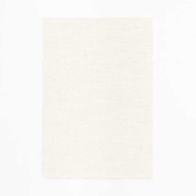 Pale ivory curtain fabric with a fine, subtly textured plain weave