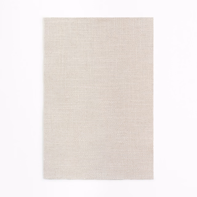 Pale greige-ivory woven swatch with a fine crosshatched surface