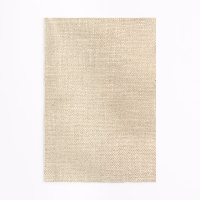 Warm sandy beige curtain fabric with a fine, even woven texture