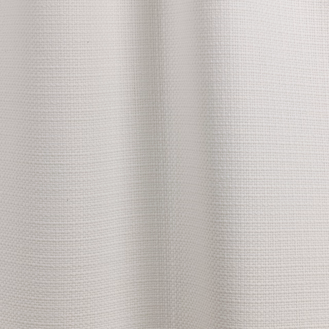 Soft ivory curtain fabric showing a fine, even grid weave