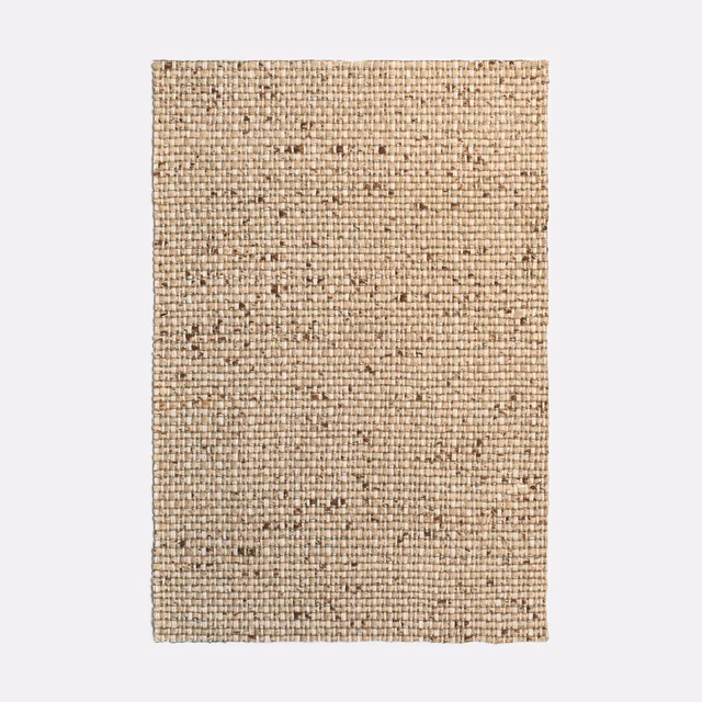 Warm natural beige woven swatch with scattered dark flecks and grid texture