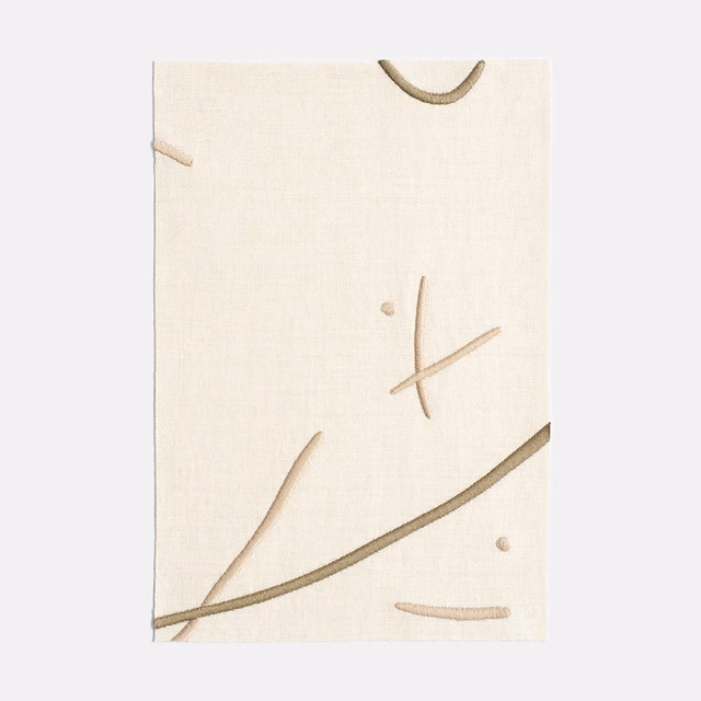 Ivory curtain fabric with sparse taupe curves and delicate linear marks