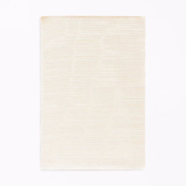 Ivory textile swatch with delicate horizontal striations and a softly ribbed surface