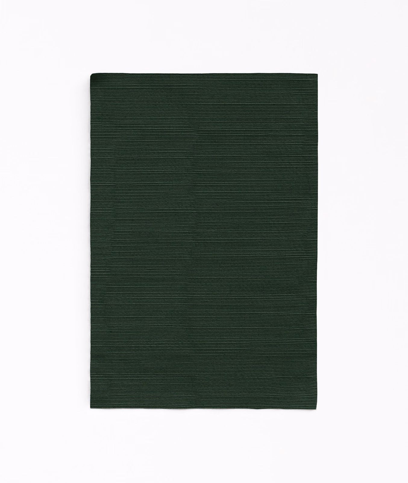 Deep forest-green curtain fabric with fine horizontal ribbing and subtle tonal variation