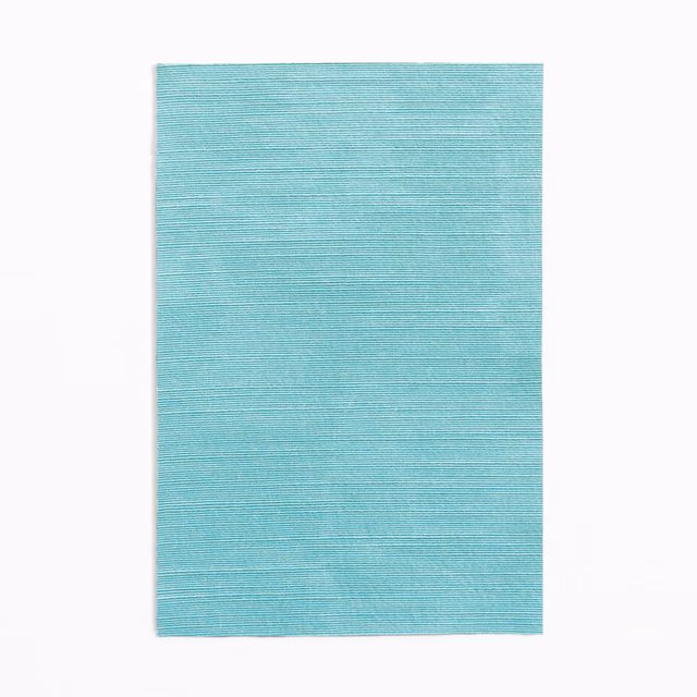 Pale turquoise teal curtain fabric with fine horizontal slub texture
