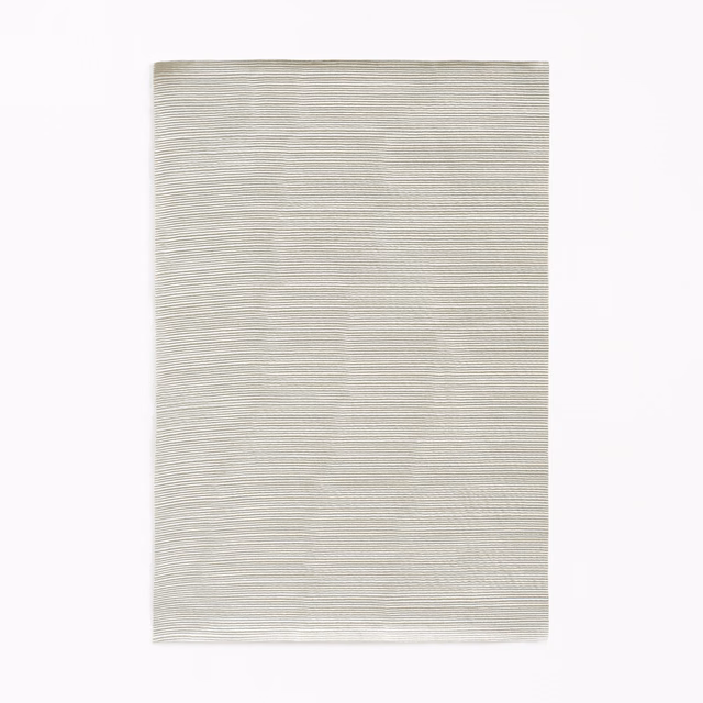 Pale greige fabric swatch with fine horizontal striations and softly textured surface