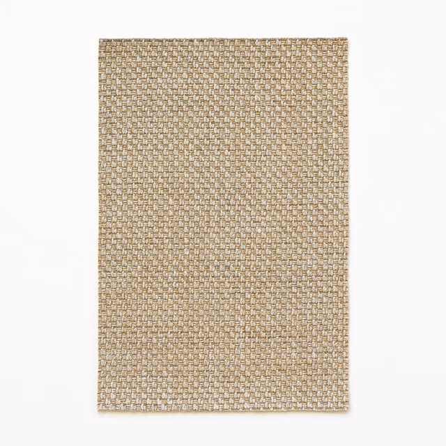 Warm oatmeal-beige woven swatch with small basket texture and subtle tonal flecks