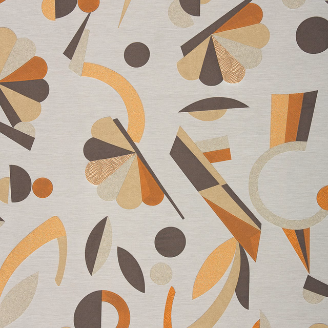 Silver-grey geometric textile with rust, charcoal, taupe and cream fan motifs