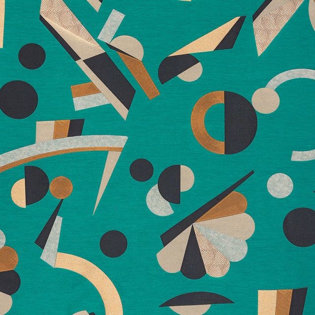 Emerald woven curtain fabric with black, cream, ochre and tan geometric forms