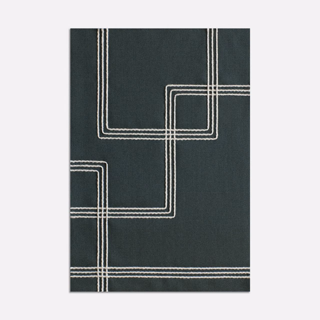 Deep petrol blue-green textile with ivory parallel lines forming rounded geometric corners
