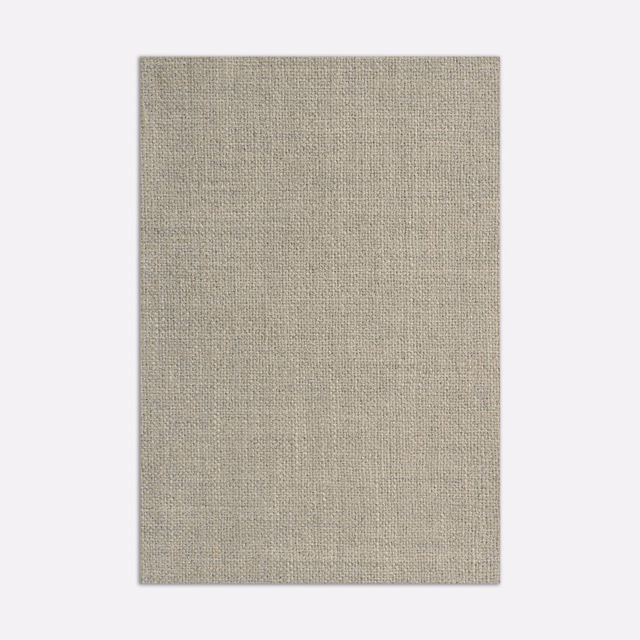 Close view of Millais Cenere’s fine ash-greige plain weave with subtle taupe flecks