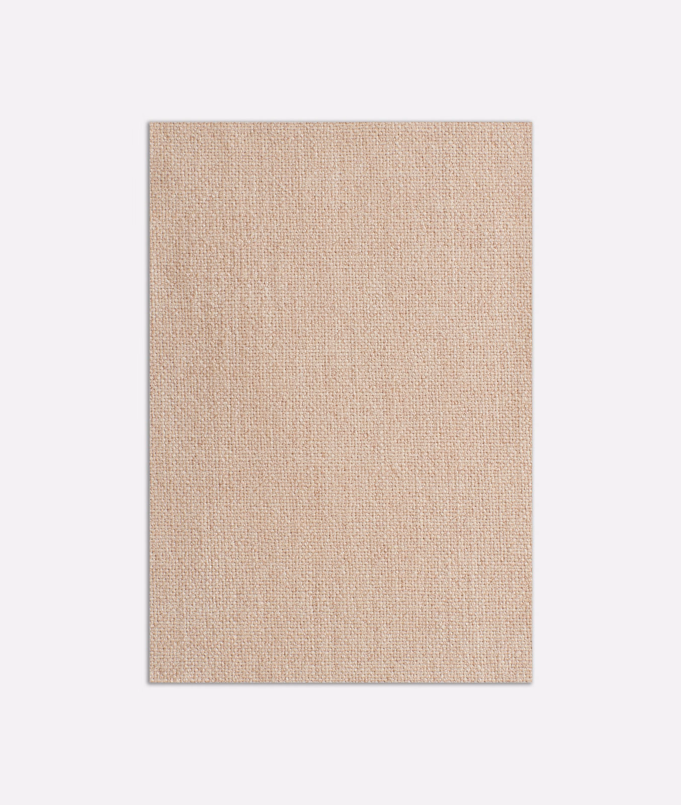 Close view of warm blush-beige plain weave with a fine, even woven texture
