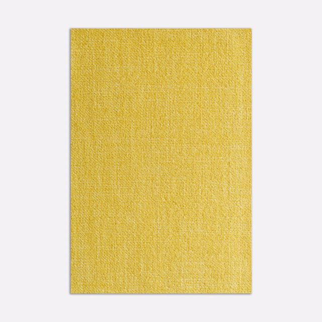 Close view of finely woven golden-yellow Frangipane textile with subtle tonal slub