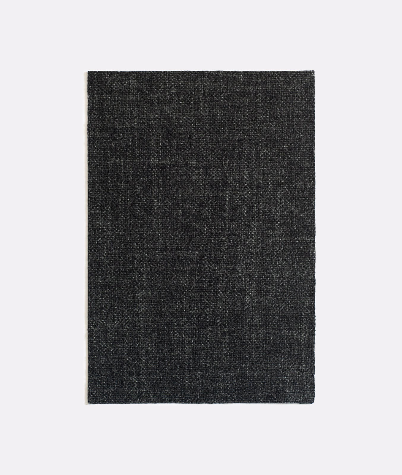 Near-black charcoal woven swatch with subtle grey grid texture