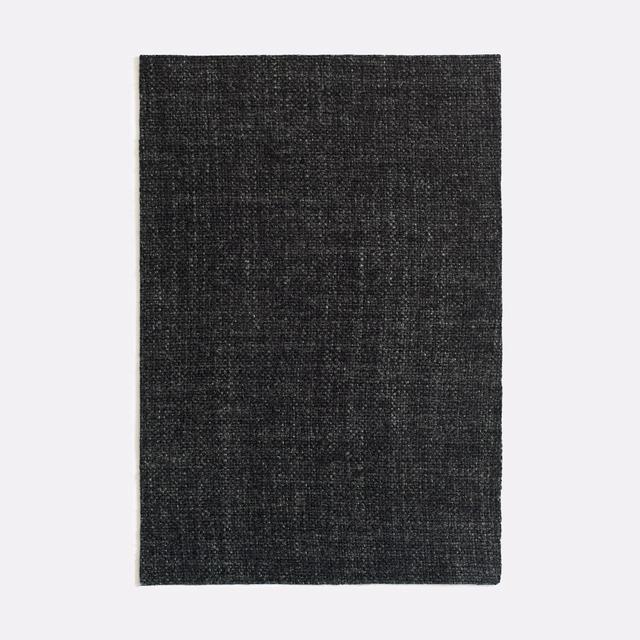 Near-black charcoal woven swatch with subtle grey grid texture