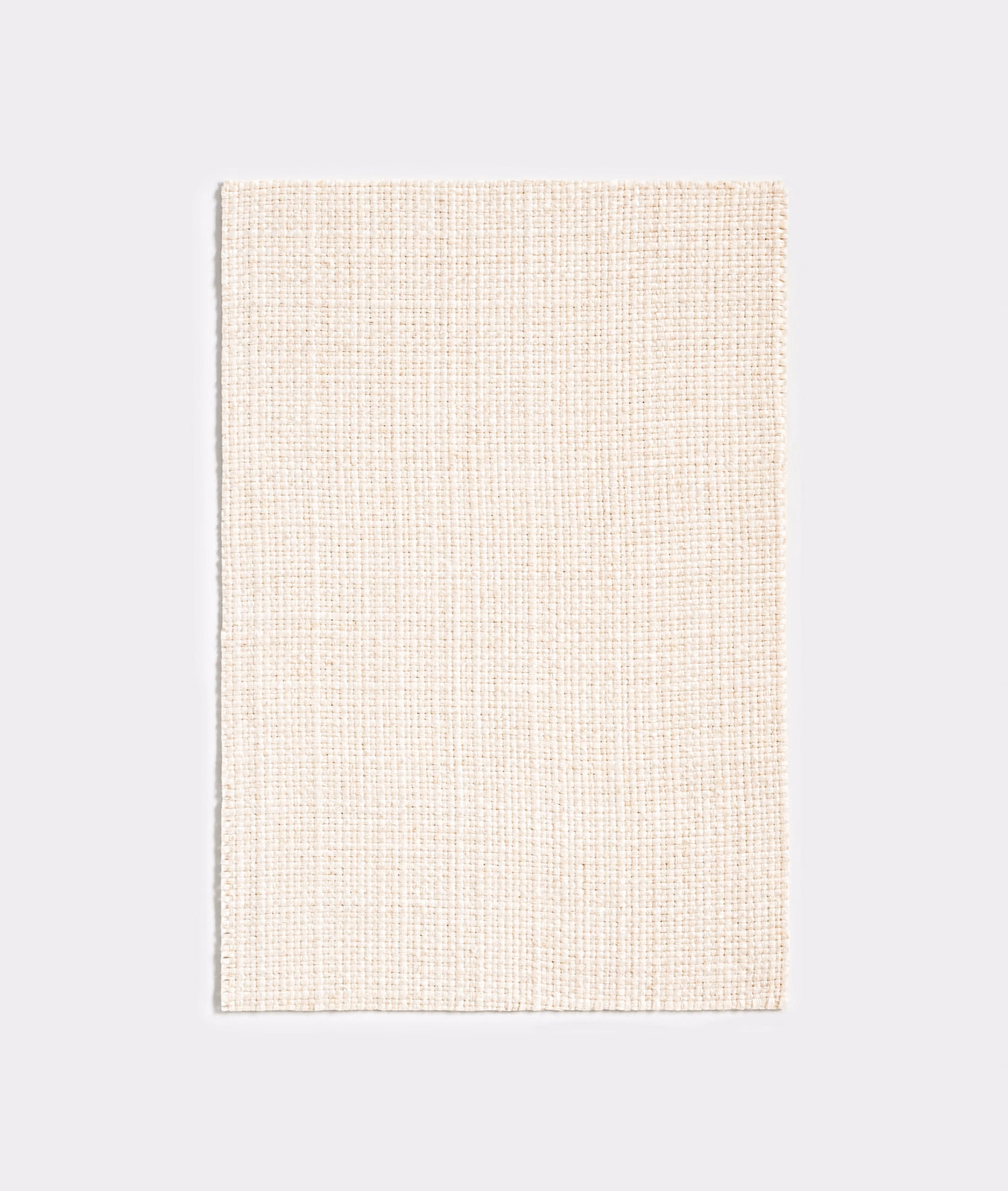 Pale ivory textile with a delicate, tightly woven crosshatch texture
