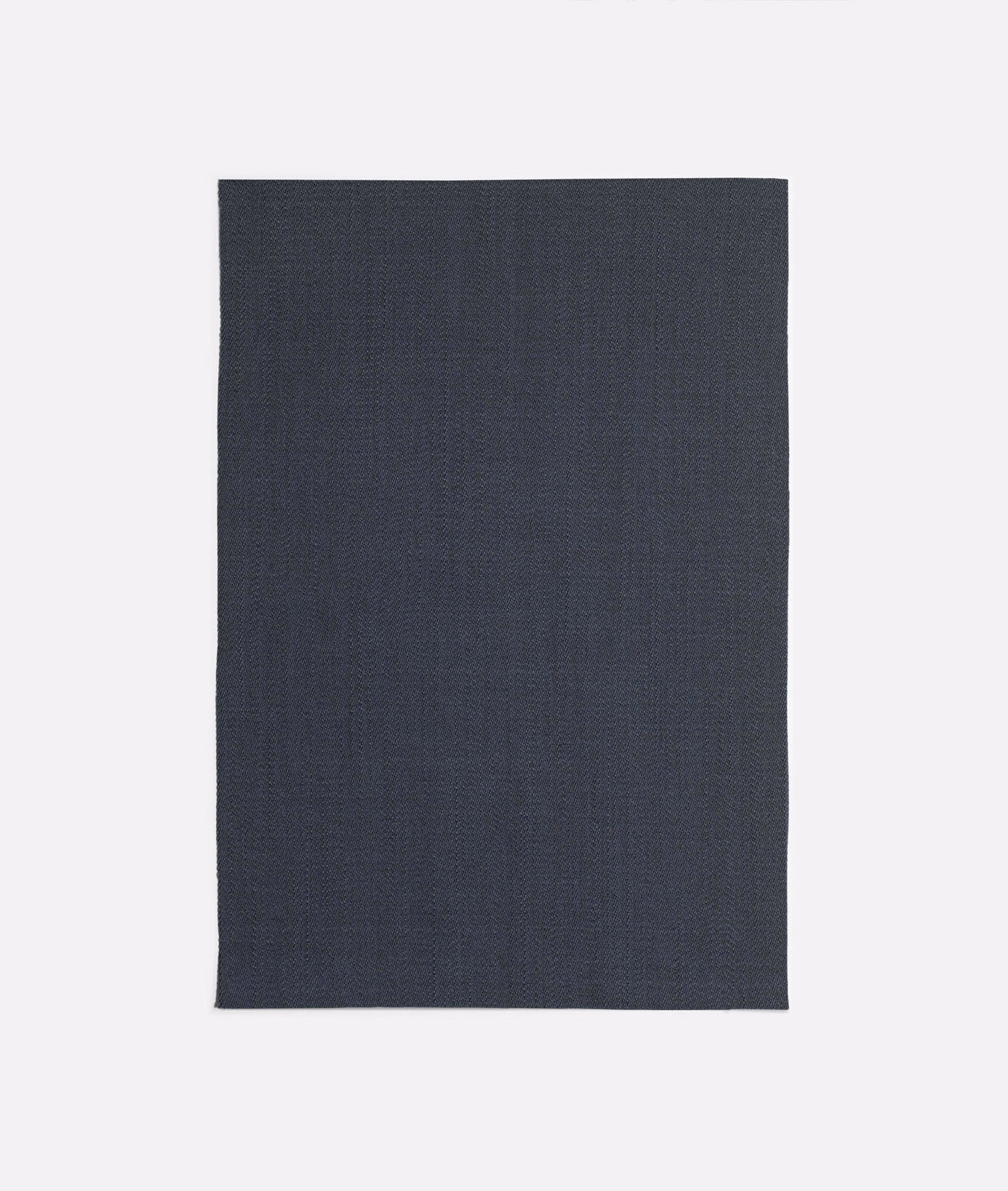 Dark slate blue-grey curtain fabric with a fine, even woven texture