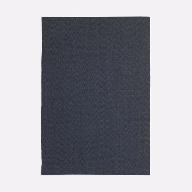 Dark slate blue-grey curtain fabric with a fine, even woven texture