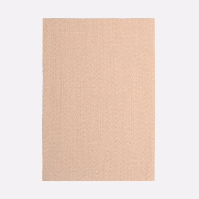 Soft cipria pink curtain fabric with a fine, subtly linear woven texture