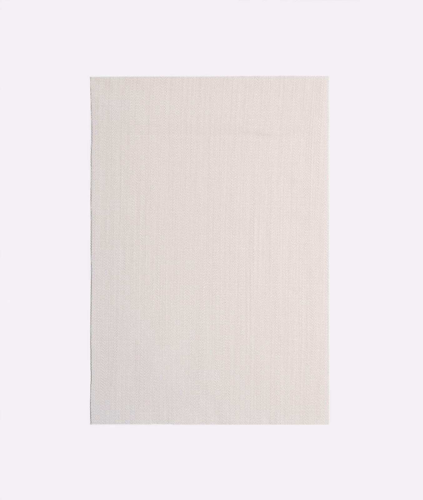 Pale warm greige curtain fabric with subtle vertical striated weave