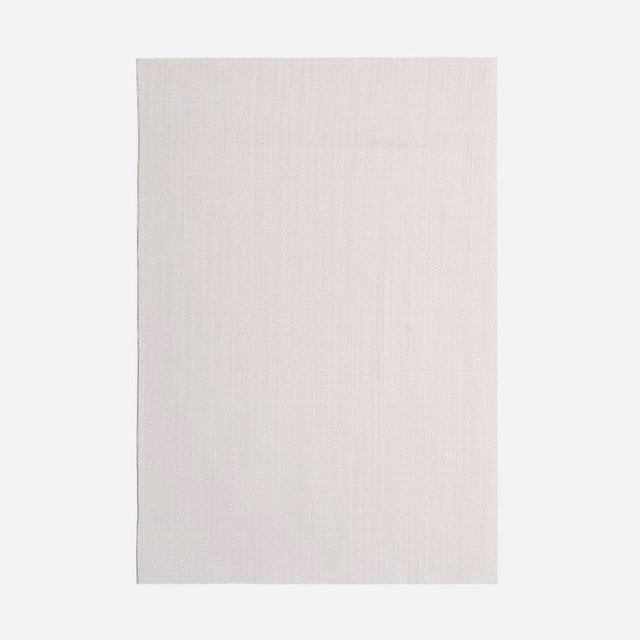 Pale warm greige curtain fabric with subtle vertical striated weave