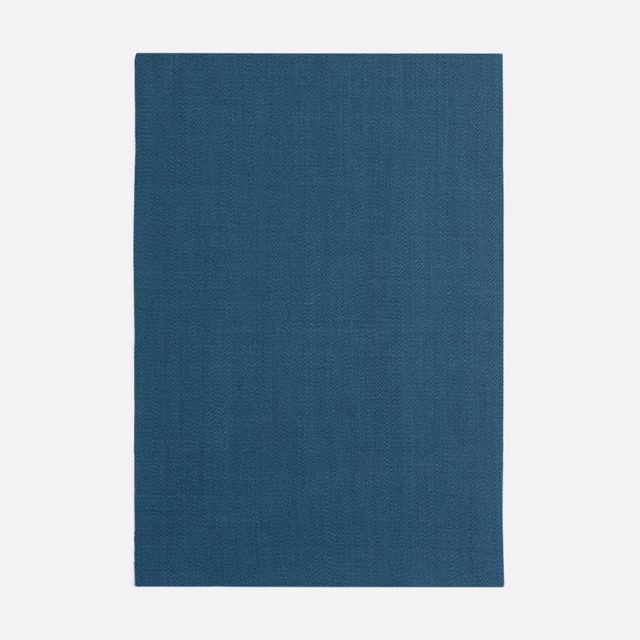 Deep blue-teal woven fabric swatch with subtle fine-grain texture