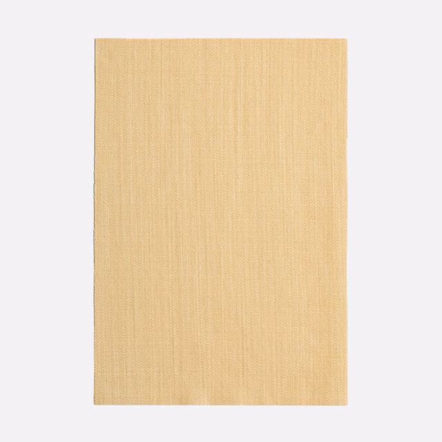 Warm peanut-butter beige curtain fabric with a fine, subtly vertical woven texture
