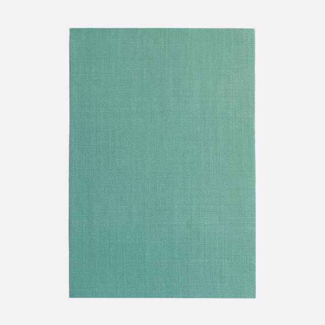 Cool turquoise-teal curtain cloth with a fine vertical woven texture