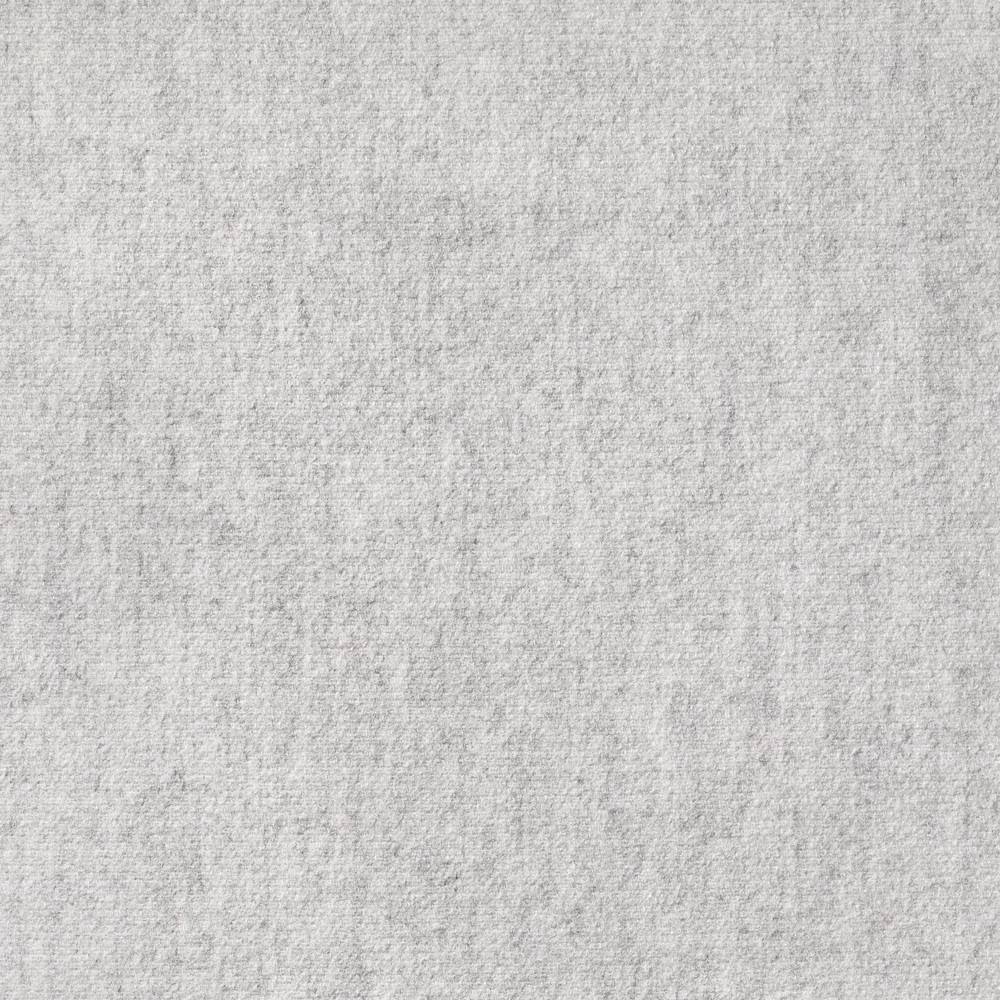 Close-up of pale pearl-grey woven fabric with subtle cloudy tonal texture