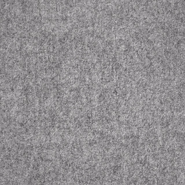 Close-up of finely mottled cool grey woven curtain fabric with subtle charcoal flecks