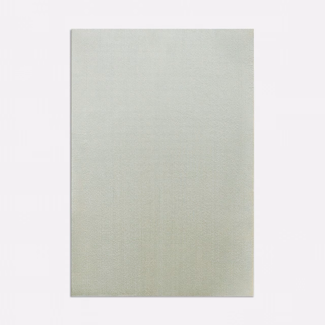 Pale celadon woven curtain fabric with a fine, quiet surface
