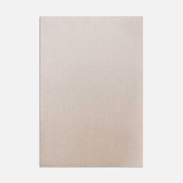 Pale nude-beige curtain fabric with a fine, softly textured woven surface