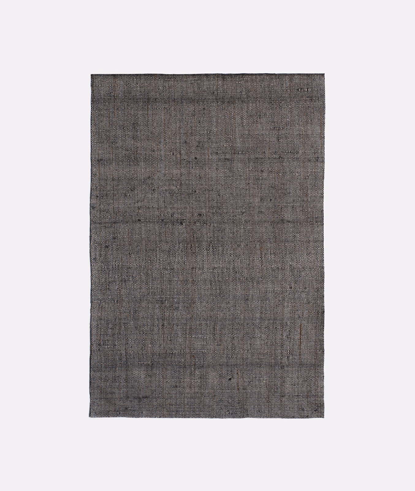 Charcoal-grey Picolit Carbone swatch showing fine crosshatched weave and tonal vertical striations