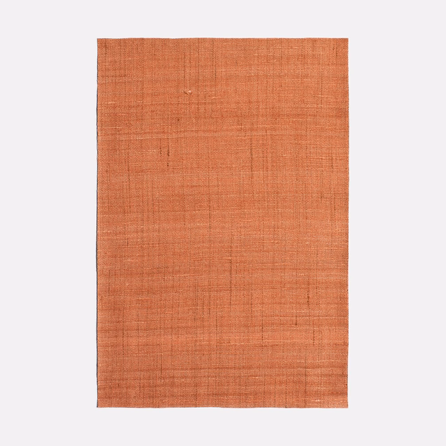 Burnt terracotta Picolit textile with a fine, irregular crosswoven surface