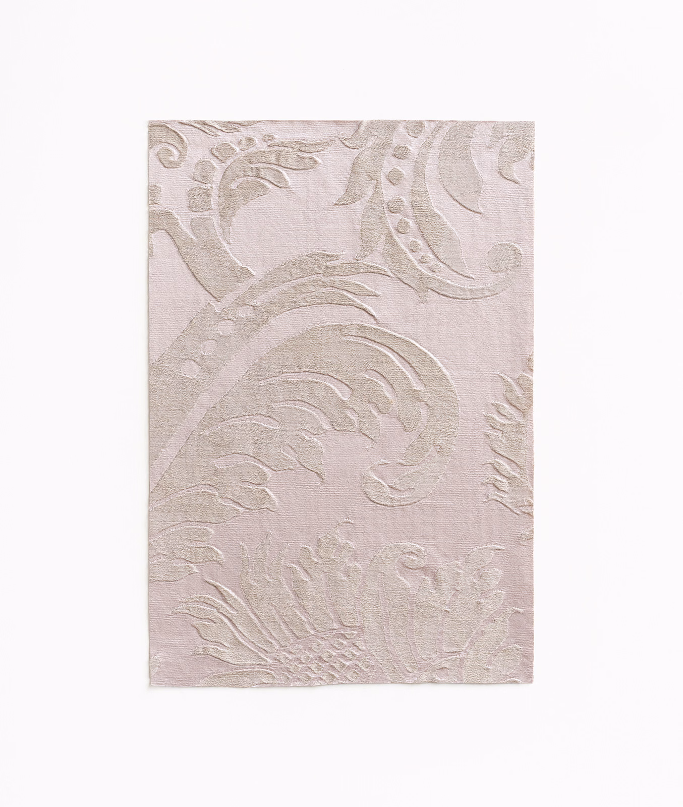 Pale lilac damask swatch with raised scrolling foliage and a soft matte sheen