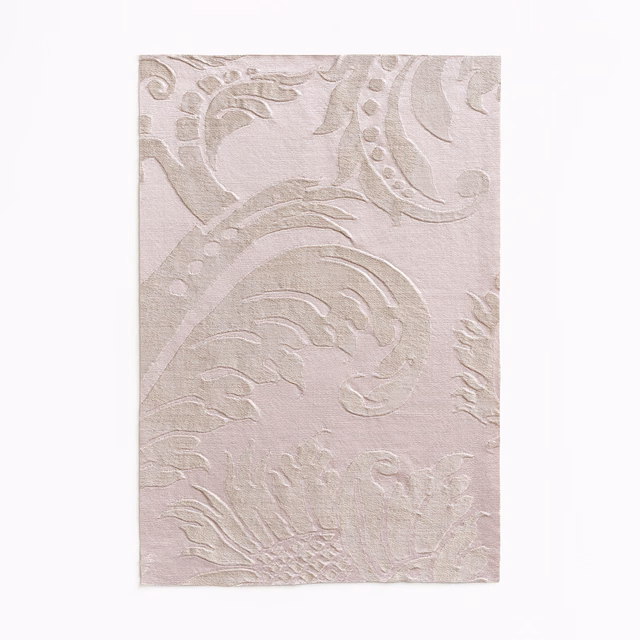 Pale lilac damask swatch with raised scrolling foliage and a soft matte sheen