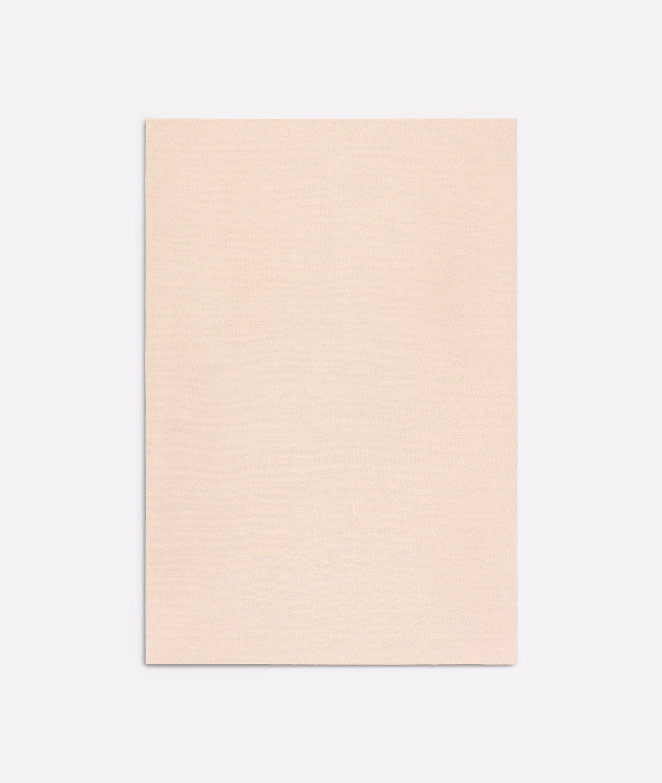 Pale blush-pink textile swatch with a fine, softly textured plain surface