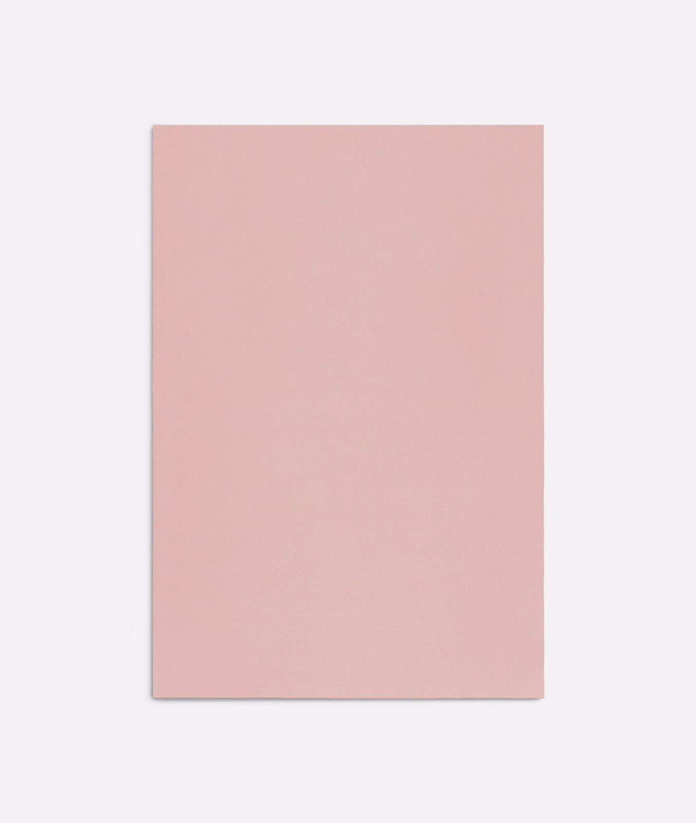 Dusty blush-pink plain fabric with a soft, subtly textured surface