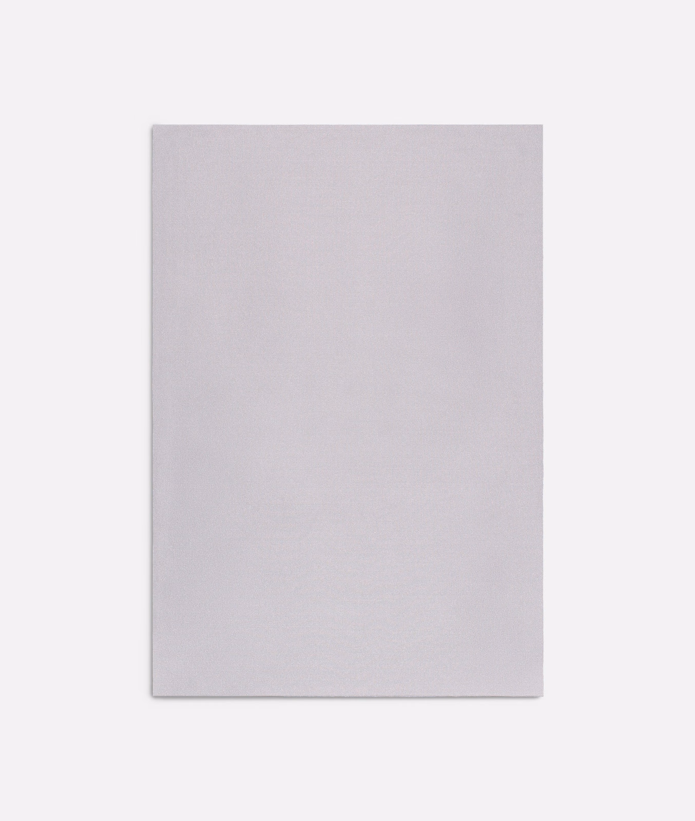 Pale cool lilac plain fabric swatch with a softly brushed, subtly textured surface