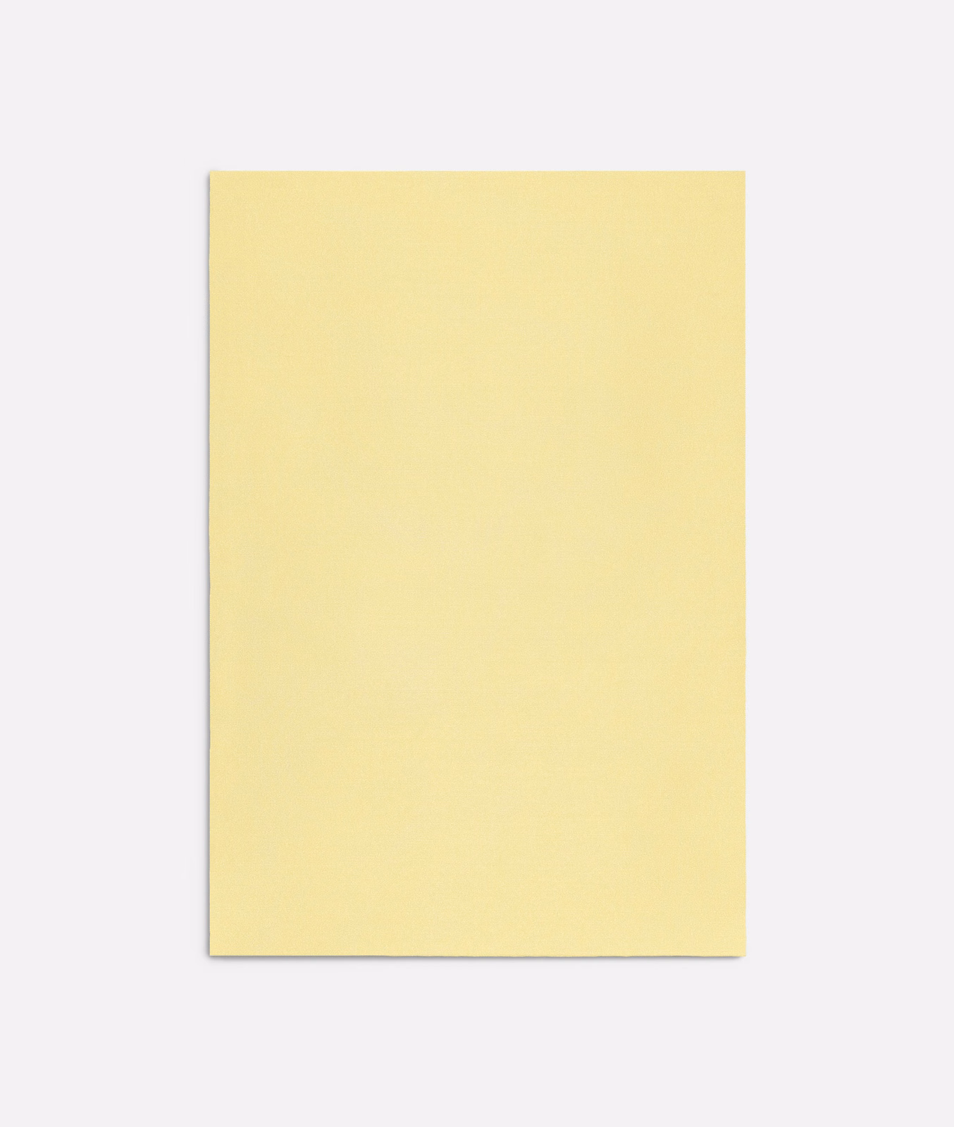 Pale lemon-yellow plain fabric with a softly even, lightly textured surface