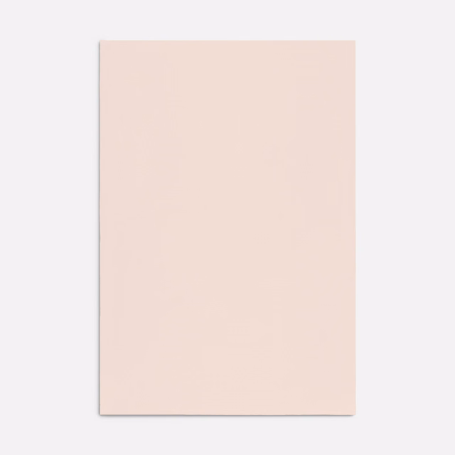 Pale blush-pink Dedar fabric swatch with a smooth, subtly textured plain surface