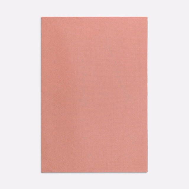 Dusty salmon-pink plain weave with a subtle horizontal grain