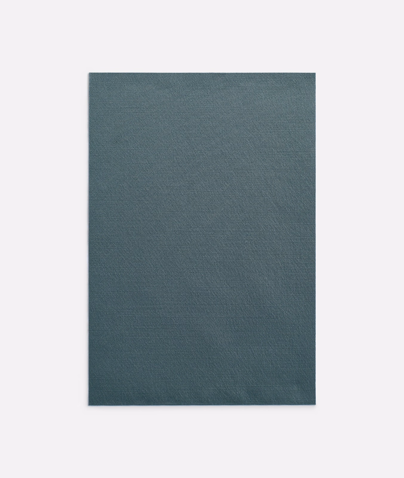 Deep antracite blue-grey curtain fabric with a fine, subtly textured woven surface