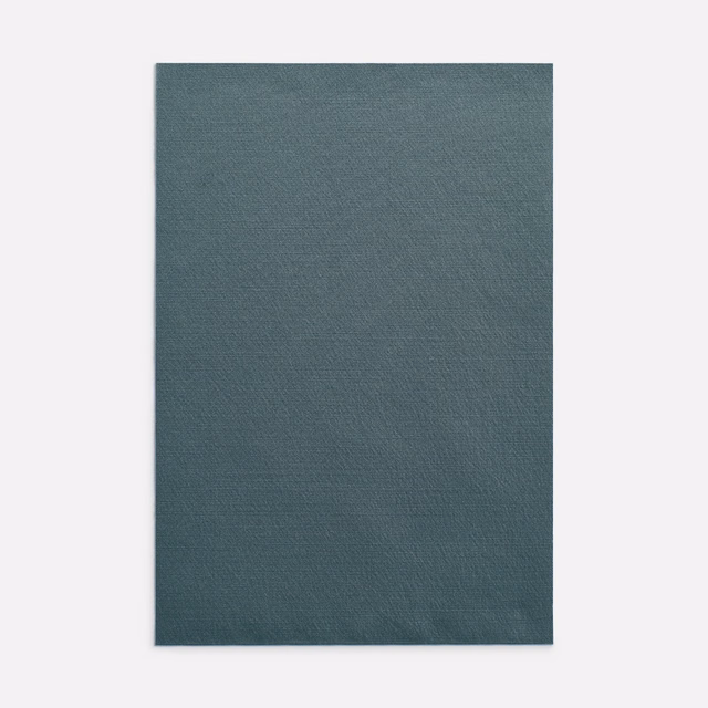 Deep antracite blue-grey curtain fabric with a fine, subtly textured woven surface