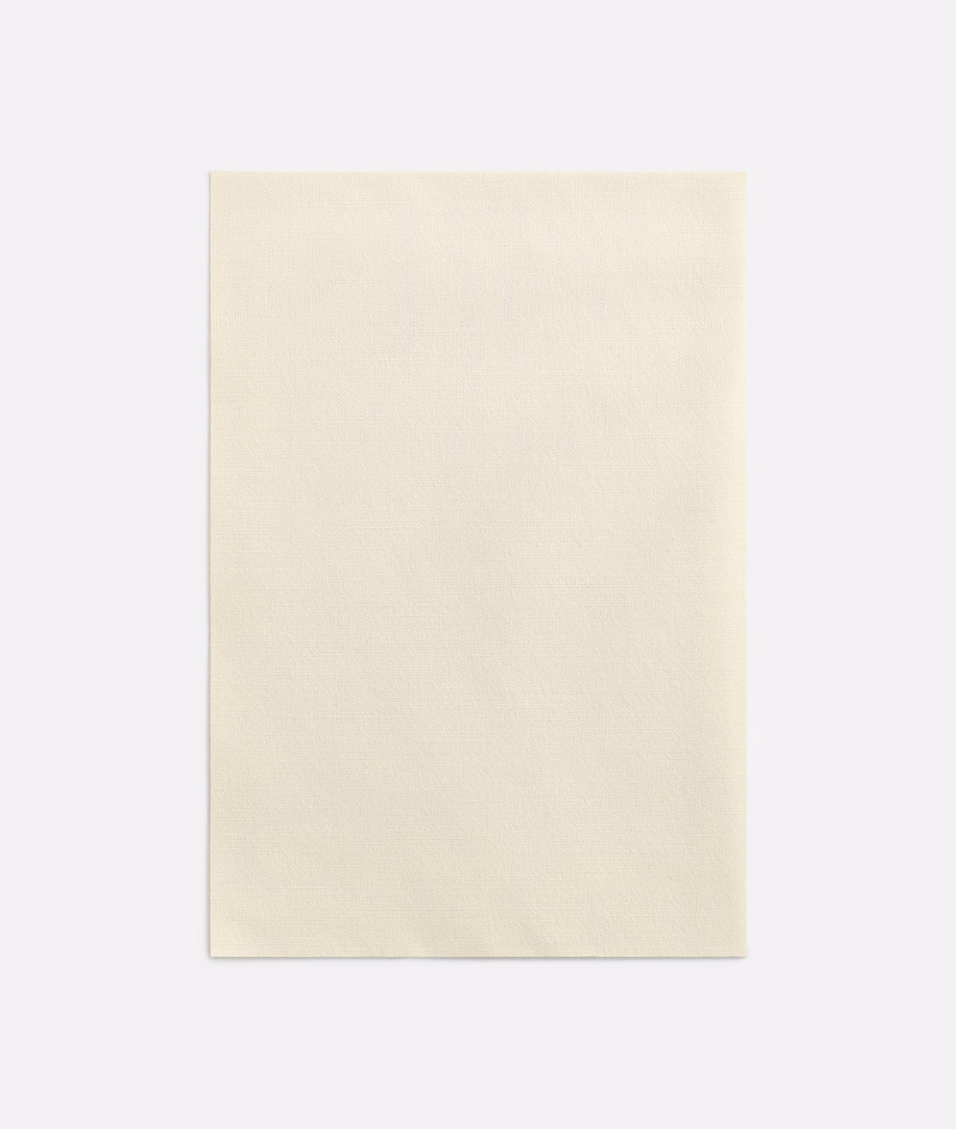 Warm ivory curtain swatch with a subtly woven, low-contrast textured surface