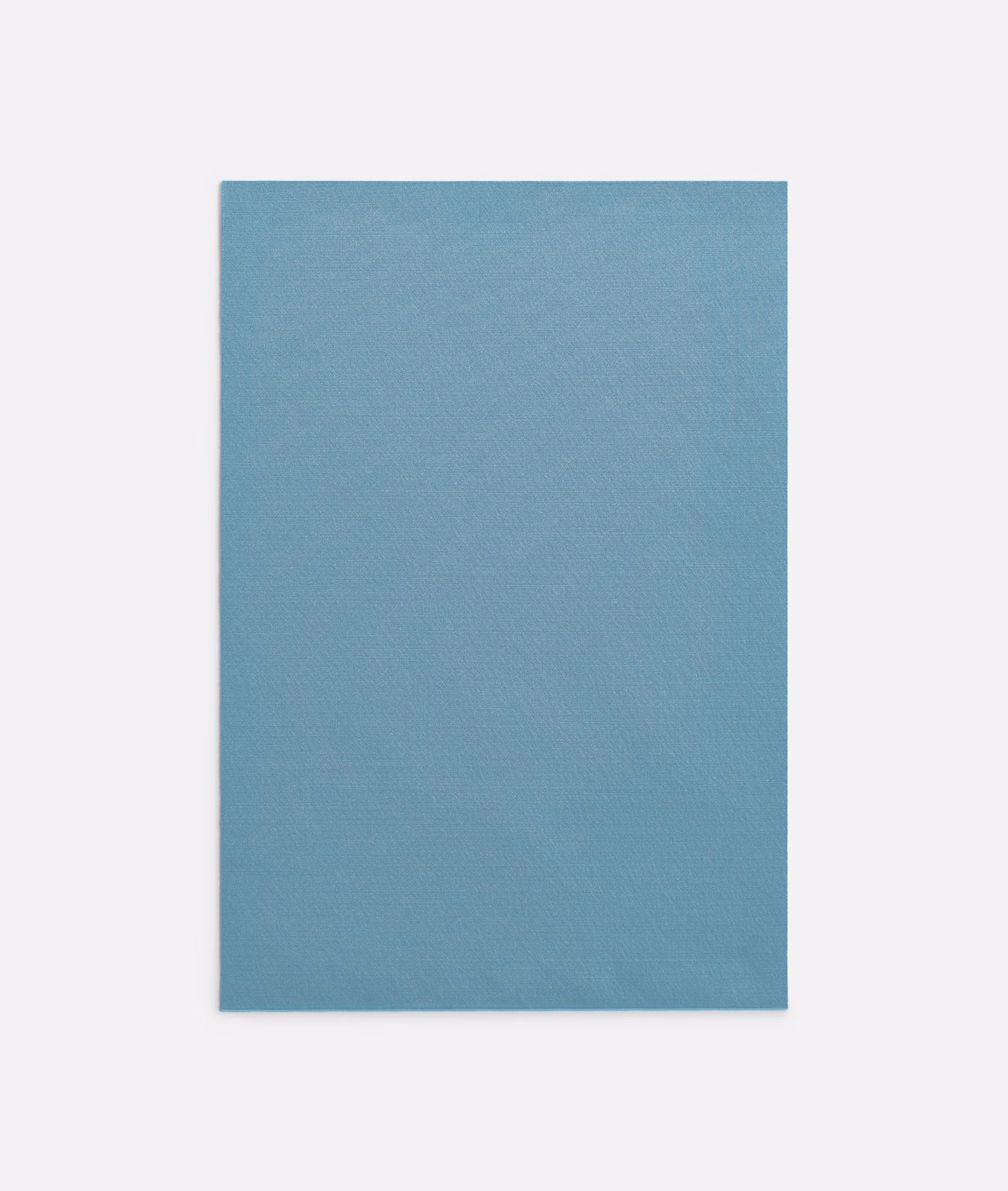 Muted blue-teal curtain fabric swatch showing a fine, even plain weave