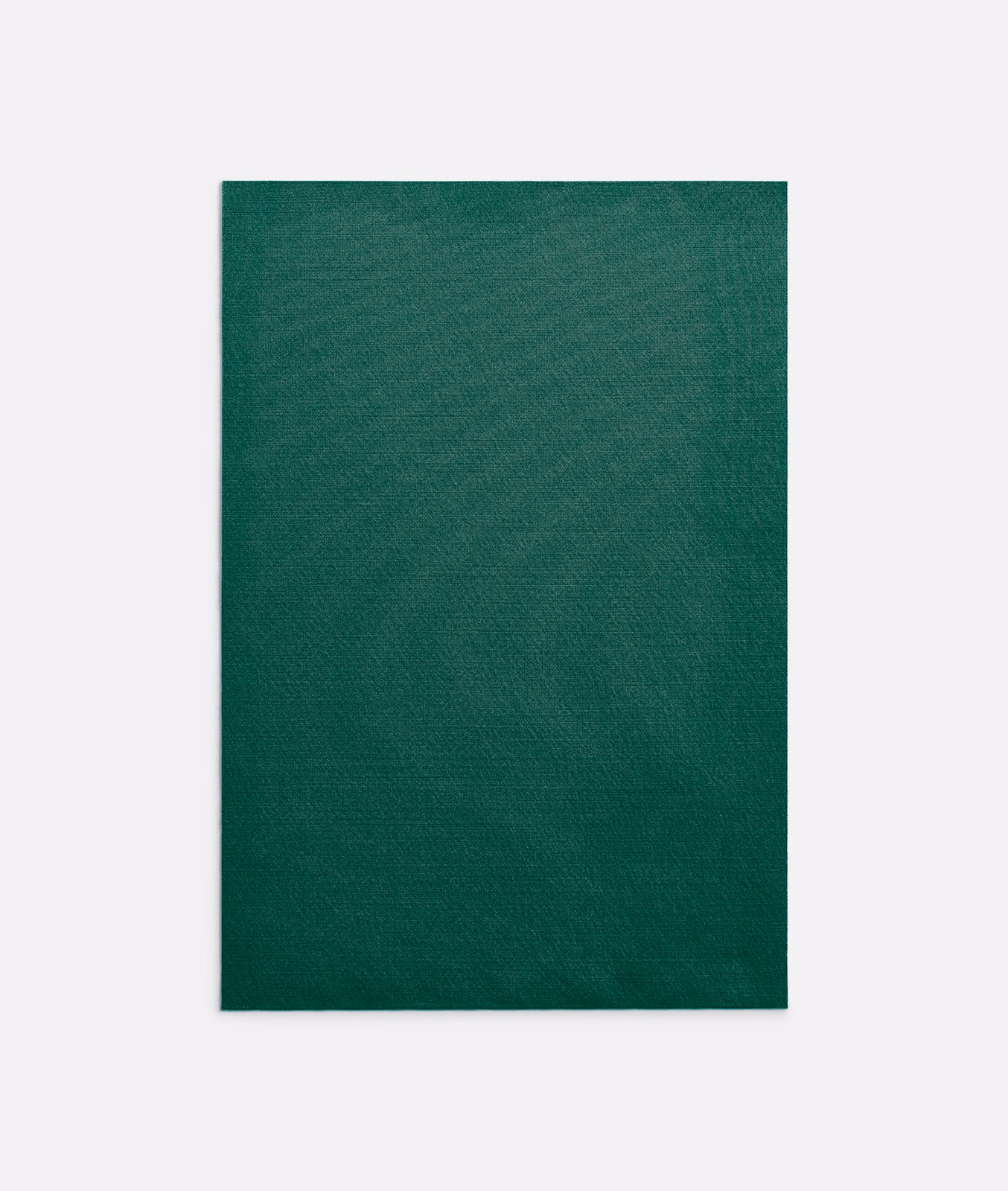 Deep forest-green finely woven curtain fabric with subtle tonal texture